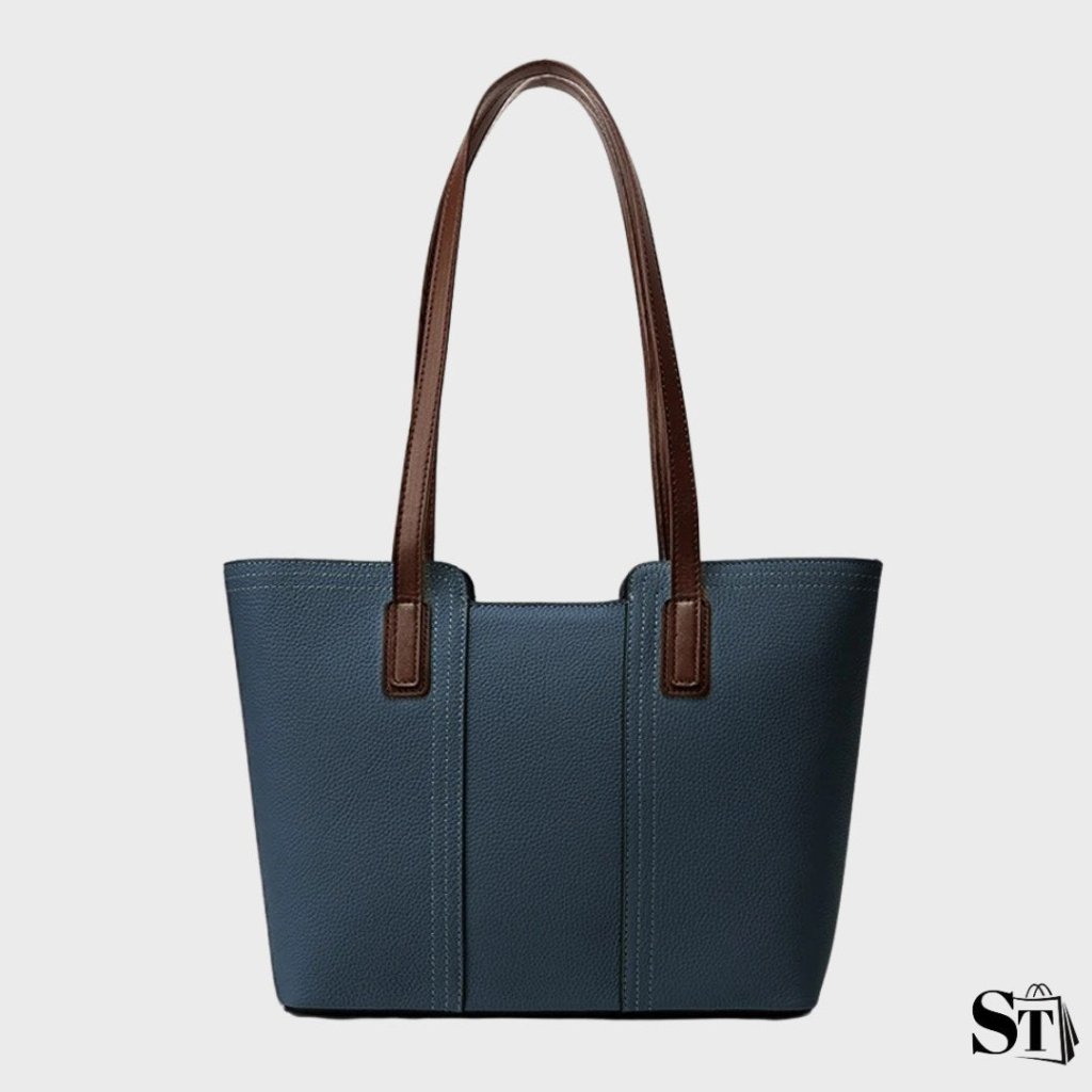 Sac cabas Le Solène en cuir bleu grainé avec anses marron foncé, vue de face