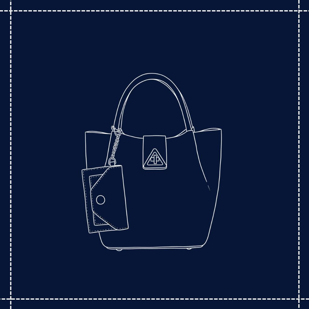 Jeune femme portant un grand sac seau en cuir marron élégant