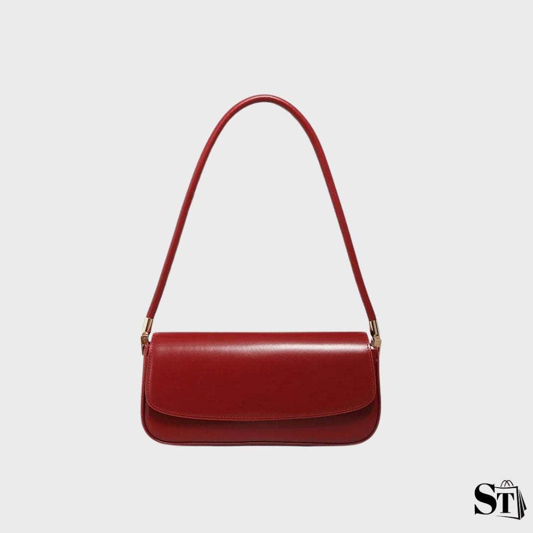 sac baguette en cuir pour femme, format allongé, fermeture sans zip sous rabat, porté épaule – modèle Le Bolso
