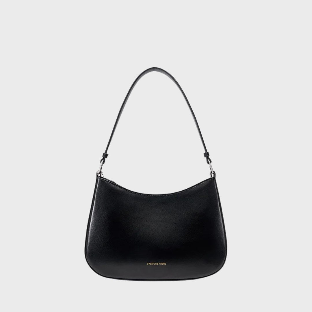 sac hobo minimaliste en cuir véritable pour femme, modèle Le Clairval, format baguette avec finitions argentées