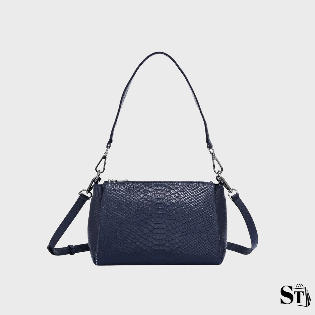 sac à bandoulière en cuir embossé alligator, forme shell, fermeture zippée, porté épaule/crossbody – modèle Le Clamecy