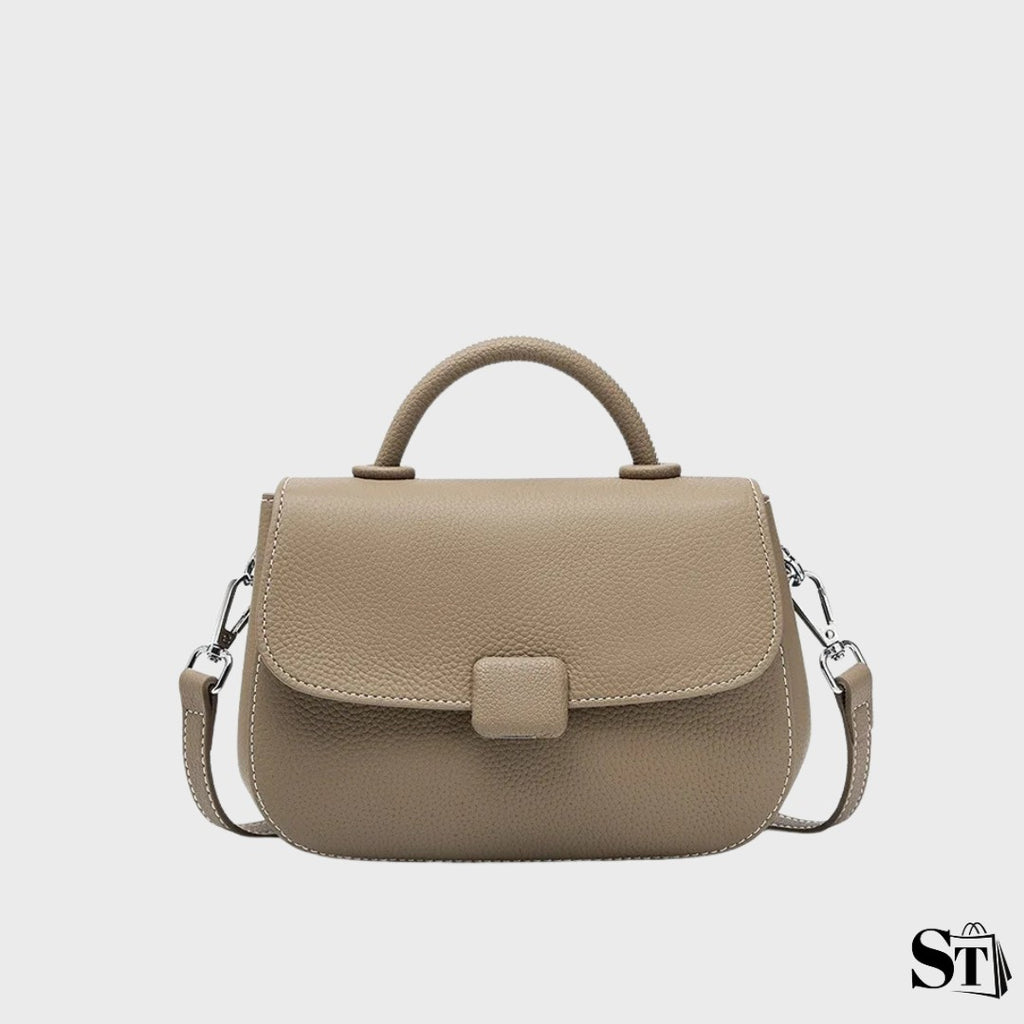 sac à bandoulière en cuir femme, forme shell arrondie, fermeture zip + fermoir, porté épaule/crossbody – modèle Le Marceau