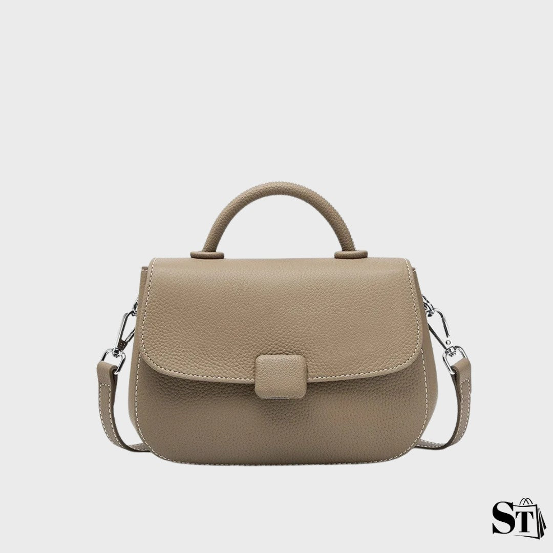 sac à bandoulière en cuir femme, forme shell arrondie, fermeture zip + fermoir, porté épaule/crossbody – modèle Le Marceau