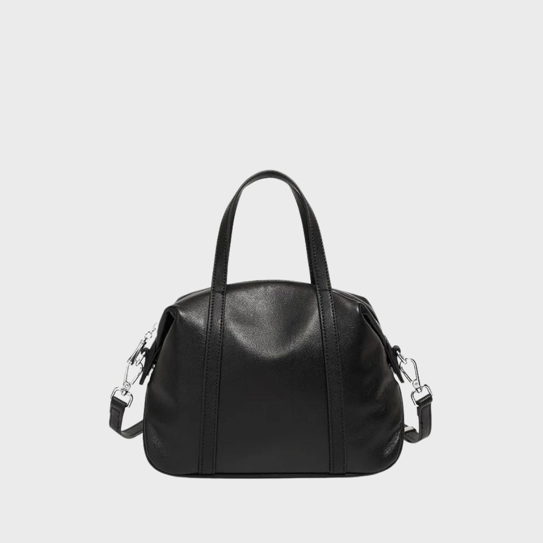 Petit sac bowling noir en cuir souple style vintage avec détails en métal argenté