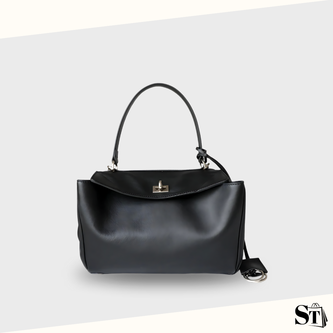 Sac à main pour femme en cuir noir avec fermeture argentée vu de face