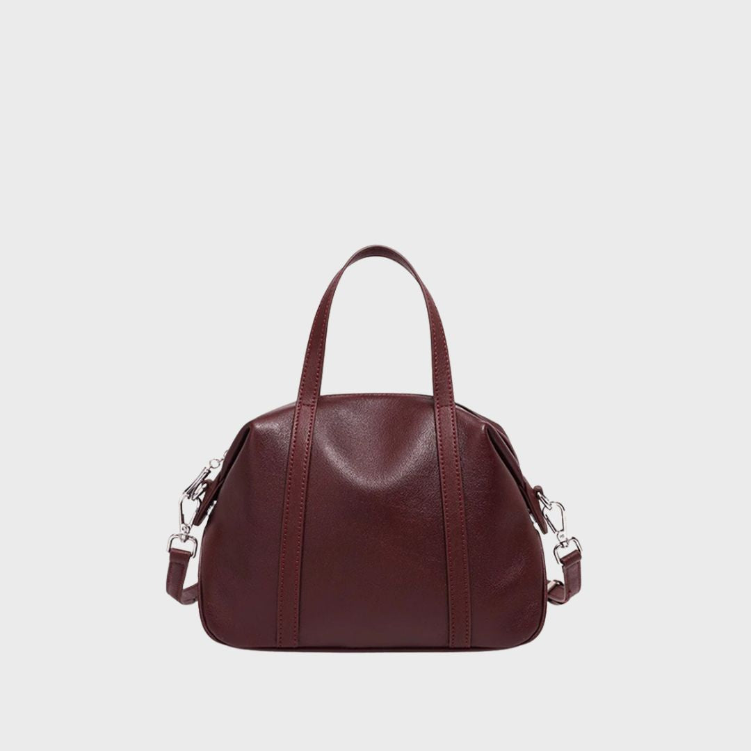 Sac bowling en cuir véritable rouge foncé modèle Le Boston avec anses et bandoulière