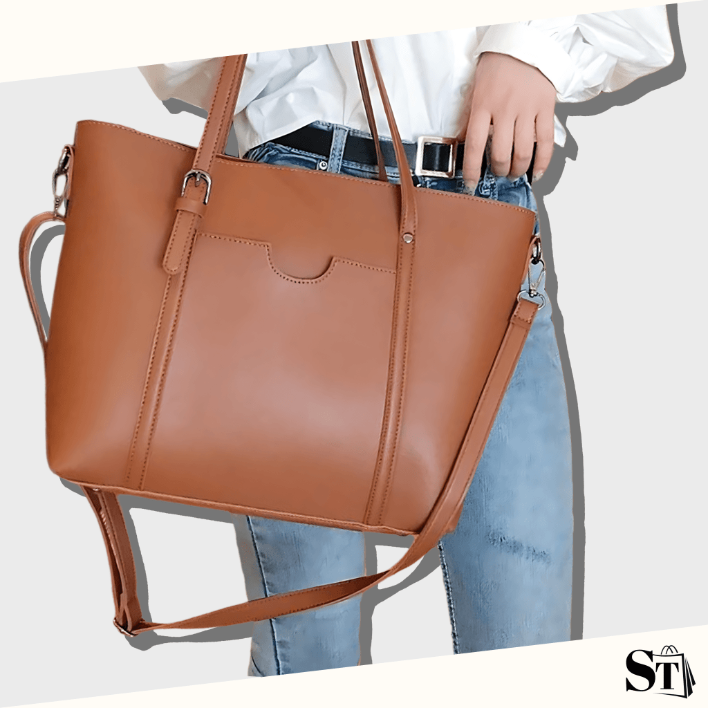 Jeune femme habillée classique portant un sac cabas bandoulière en cuir synthétique marron