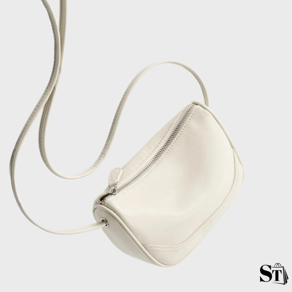 Petit sac à bandoulière Cocon en cuir blanc – vue suspendue avec bandoulière fine