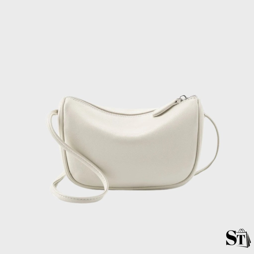 Petit sac à bandoulière Cocon en cuir blanc cassé pour femme – vue de face studio