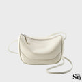 Petit sac à bandoulière Cocon en cuir blanc pour femme – format compact et style épuré