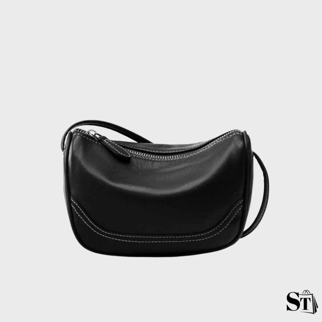 Petit sac à bandoulière Cocon en cuir noir pour femme – style minimaliste chic